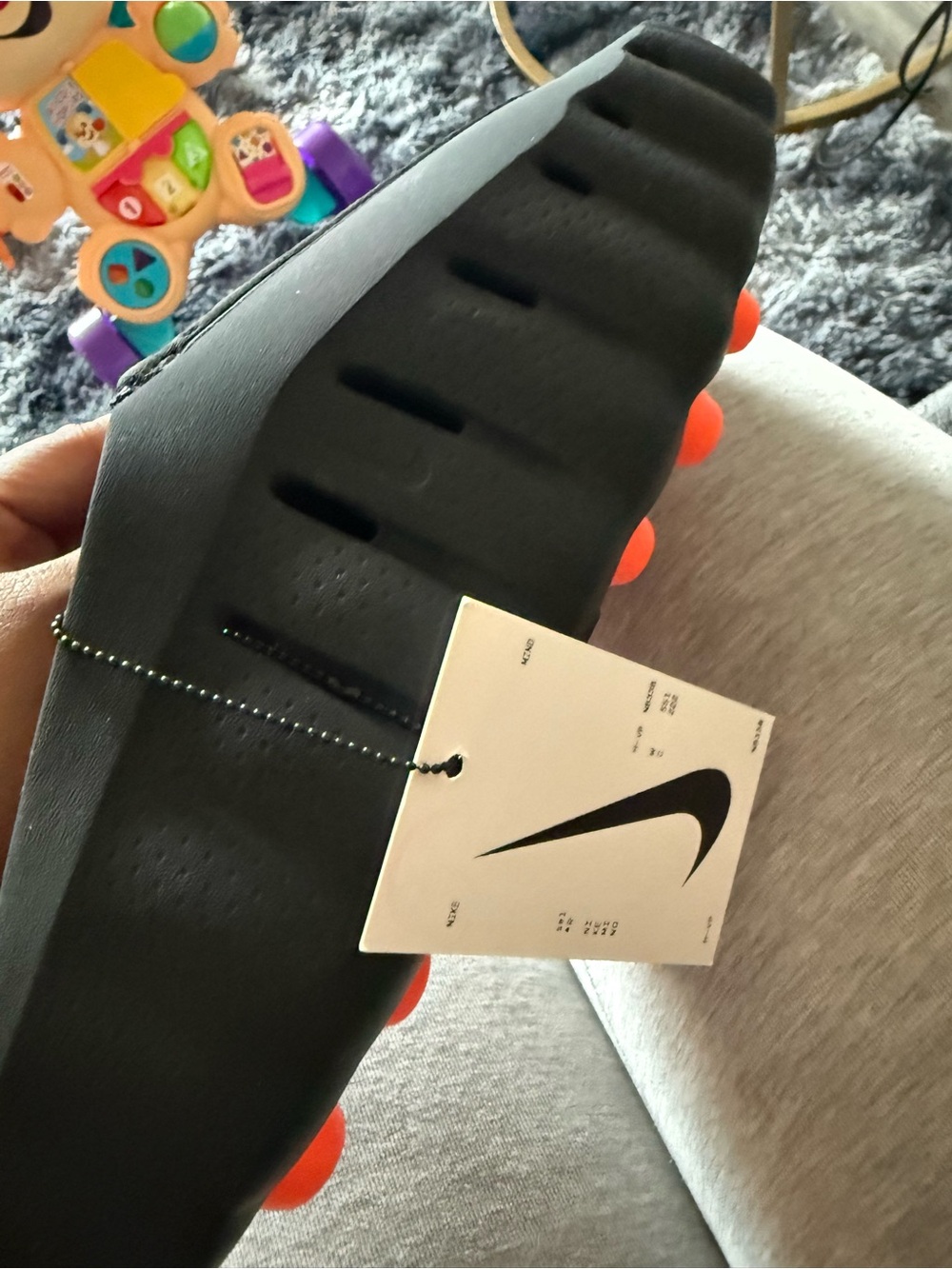 Nike Black Slide Sandal with Orange Stud Accents